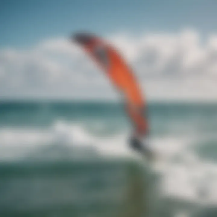 Aerial view of a kitesurfer mastering the waves with a kitewing