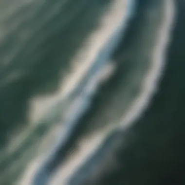 Aerial view of kiteboarders riding the waves