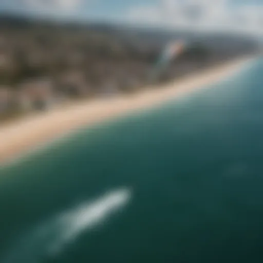 Aerial view of a kitesurfer performing tricks with an inflatable kite