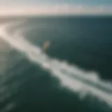 Aerial view of kitesurfers in motion on the ocean