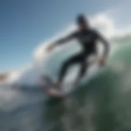 Electric body board rider catching a wave