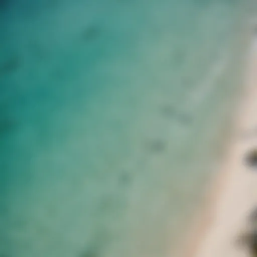 Aerial view of kiteboarders in crystal-clear waters