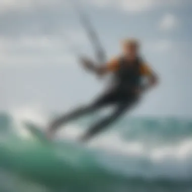 Close-up of a kiteboarder catching the wind and waves