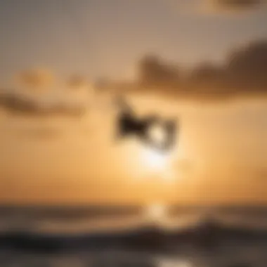 Silhouette of a kiteboarder performing tricks at dusk