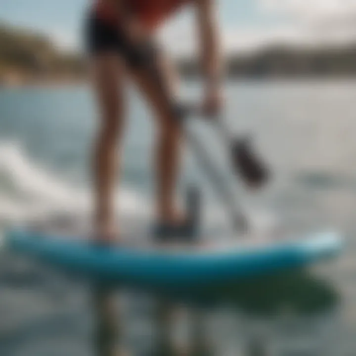 A sleek battery-operated paddle board pump in action