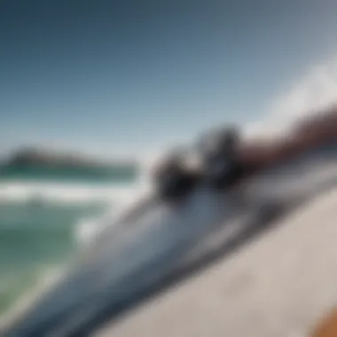 Close-up of kitesurfing board with ocean backdrop