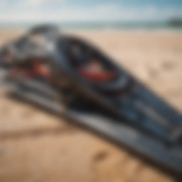 Close-up of kitesurfing gear laying on the beach