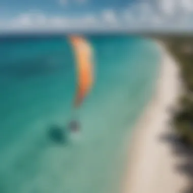 An aerial perspective of kitesurfers gliding over the turquoise waters, highlighting the perfect conditions for the sport in St. Lucia.