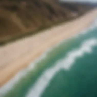 Aerial view of colorful kiteboarding kites on a windy day