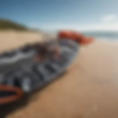 Close-up view of kitesurfing gear laid out on the beach ready for action