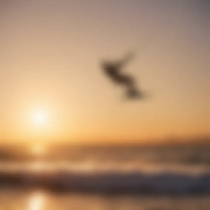 Dynamic kiteboarding jump against a golden sunset sky