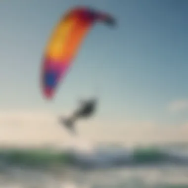 Close-up of kitesurfer riding the waves with colorful kite in the sky