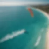 Aerial view of kitesurfing kite on turquoise waters