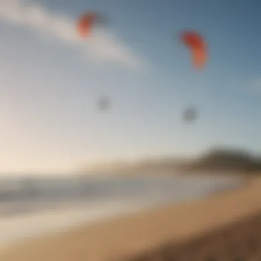 Panoramic shot of a serene beach setting with Cabrinha kites in the background