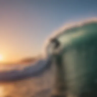 Surfer catching a wave during sunset in California