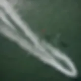 Aerial view of kitesurfers navigating the waves at Cocoa Beach