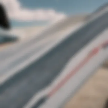 High-Performance Kitesurf Surfboard Detailed view of a high-performance kitesurf surfboard showcasing its fins and rocker
