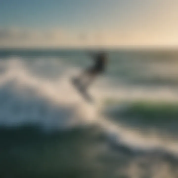 Aerial view of kite boarder riding waves