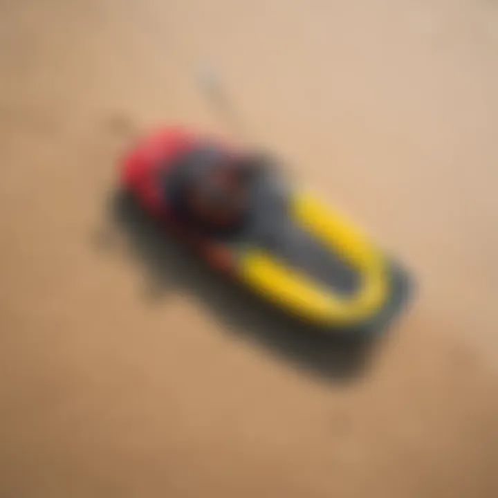 Aerial view of colorful kitesurfing gear on a pristine beach