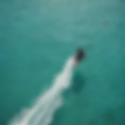 Aerial view of kiteboarders in action on turquoise waters