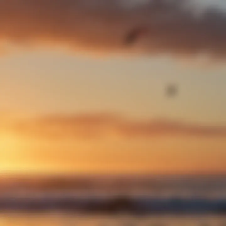 Kiteboarder in action against a stunning sunset over the Pacific Ocean