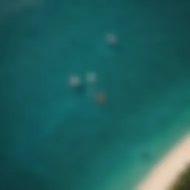 Aerial view of kitesurfers in turquoise waters