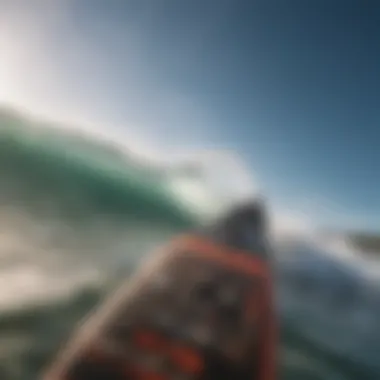 Close-up of kitesurfing board cutting through waves