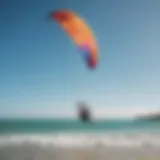 A vibrant kitesurfing scene at Miami Beach capturing colorful kites soaring against a clear blue sky