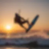 Dynamic kitesurfing action at sunset