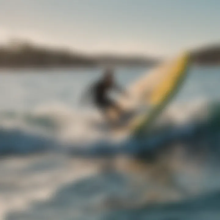 Dynamic water splashes as surfboard is towed behind a boat