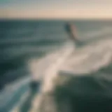 Graceful aerial view of kitesurfer in action