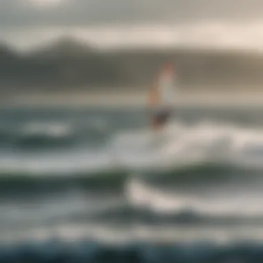 An aerial shot of kitesurfers gliding over gentle waves with low wind kites.