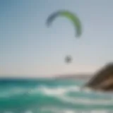 A breathtaking view of kitesurfers gliding over the turquoise waters of Algarve.