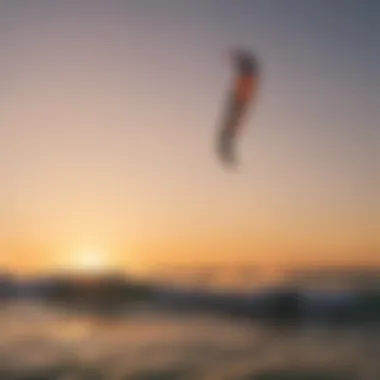 A serene beach scene with kitesurfers riding the waves during sunset, capturing the essence of freedom.