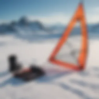 Close-up of essential snow kite surfing gear laid out on a snowy ground