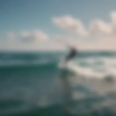 An aerial shot capturing a surfer gliding effortlessly above the water on a foil surfboard.