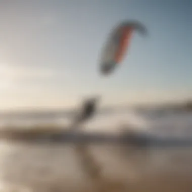 A serene beach scene with kiteboarders enjoying the sport.