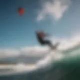 Kiteboarder riding the waves