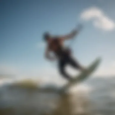 A kitesurfer navigating the waves under clear blue skies