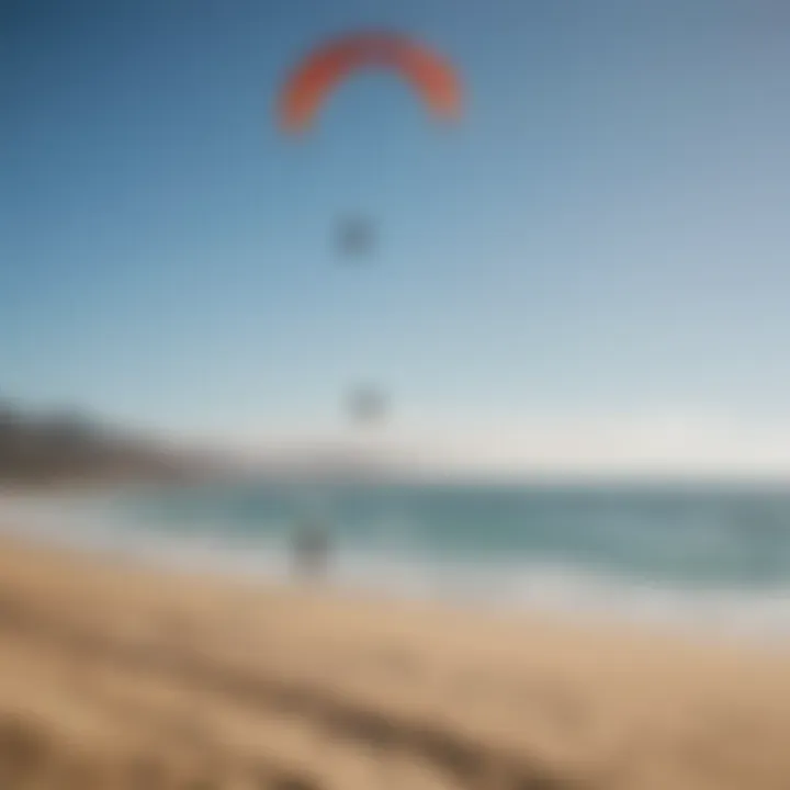 A scenic view of a popular kitesurfing location with enthusiasts enjoying the sport