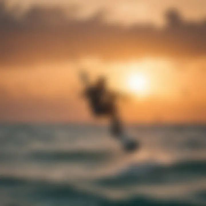 A kiteboarder executing impressive tricks against the backdrop of Aruba's golden sunset