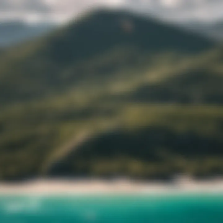 Kiteboarder performing an aerial trick over turquoise waters