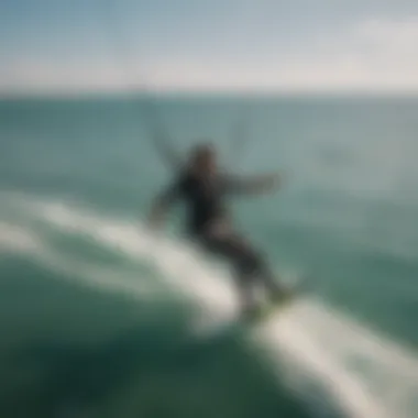 Aerial view of kitesurfing session featuring split toe booties