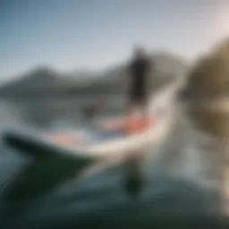 A close-up of a wing surfing setup on a serene lake