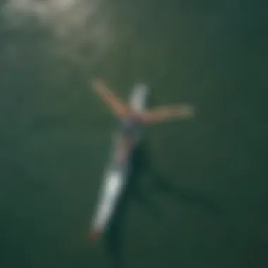 An aerial view of a wingfoil SUP competition showcasing skill and excitement.