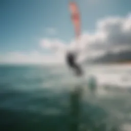 Aerial view of eFoil rider gliding over crystal-clear waters