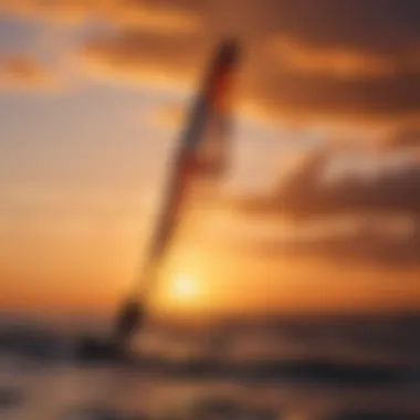 Silhouette of kite foiler against vibrant sunset sky