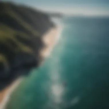 Aerial view of SUP foiling in a serene coastal setting