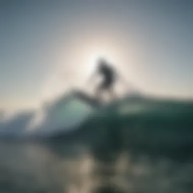 Rider carving through crystal clear waves with a SUP foil