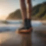 Elegantly designed SUP booties on a pristine shoreline